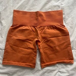 NVGTN Burnt Orange Pro Seamless Shorts